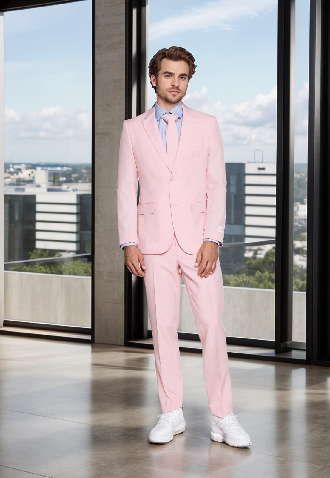 Traje rosa suave, sutil y chic